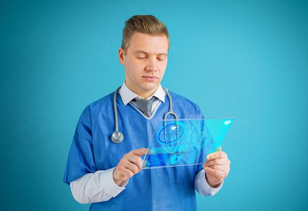 Doctor using futuristic glass tablet computer