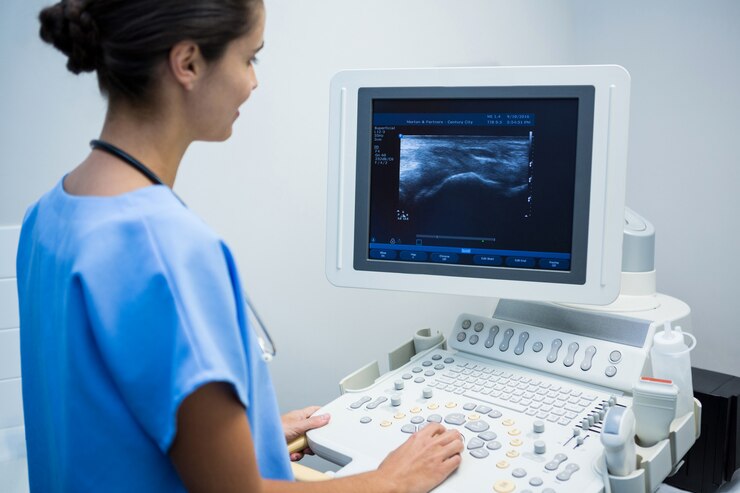 Photo doctor using sonography machine