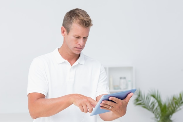 Doctor using tablet pc 