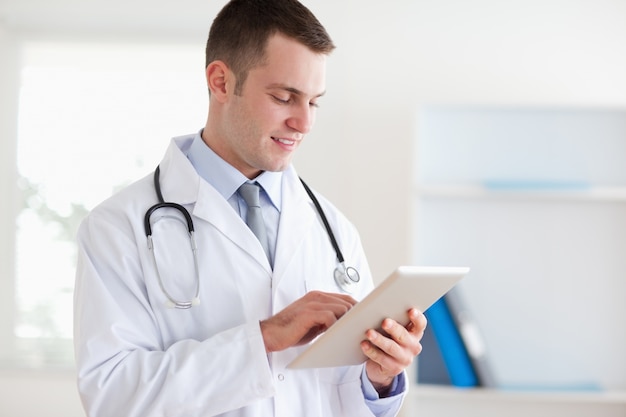 Doctor using tablet