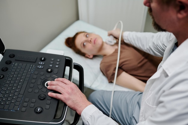 Photo doctor using ultrasound machine