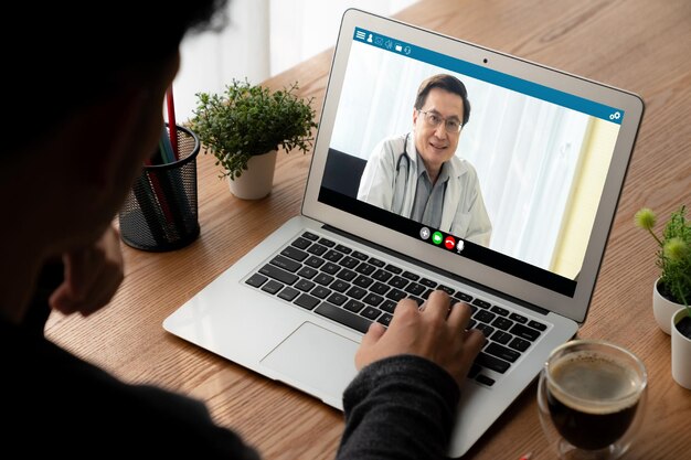 Photo doctor video call online by modish telemedicine software application for virtual meeting with patient