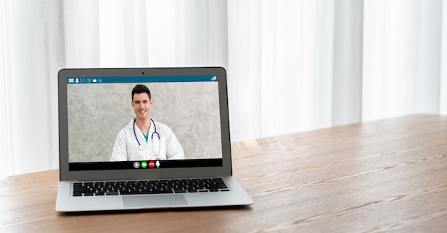 Photo doctor video call online by modish telemedicine software application for virtual meeting with patient