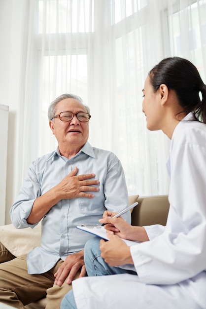 Doctor visiting the patient at home