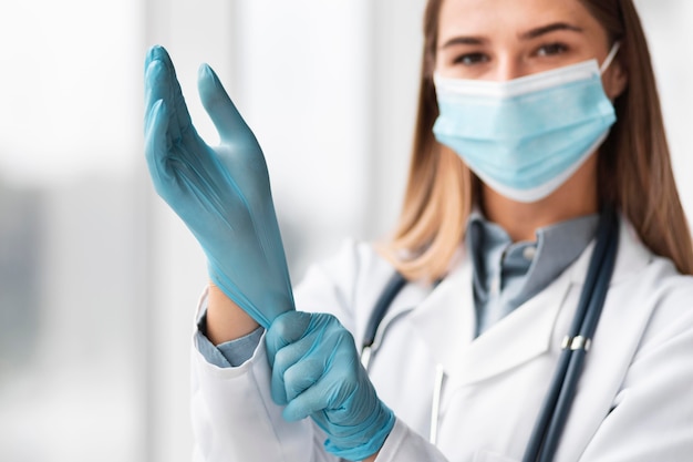 Doctor wearing face mask at the hospital