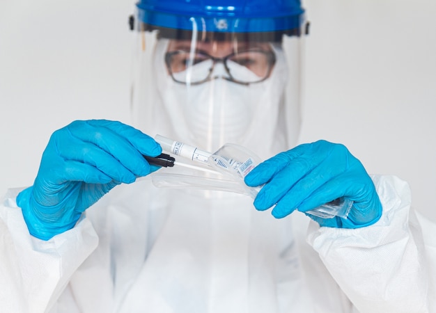 A doctor wearing a protective suit to fight coronavirus pandemic