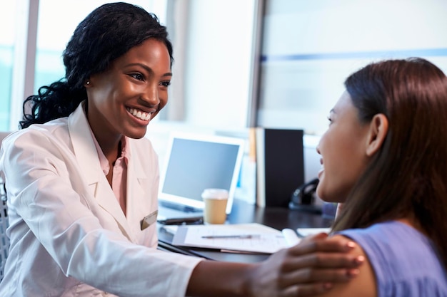 Doctor Wearing White Coat Meeting With Female Patient