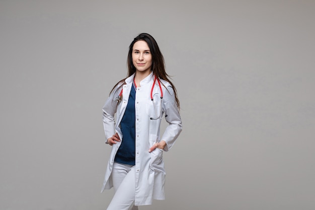 Doctor in white coat with stethoscope. space