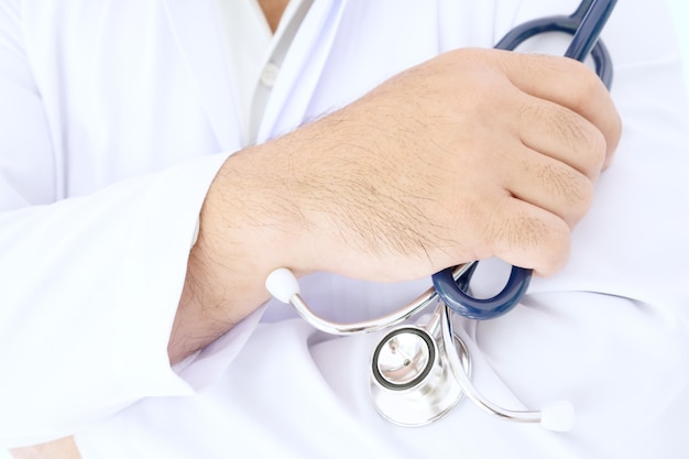 Doctor in white gown uniform with stethoscope in a hospitsl.