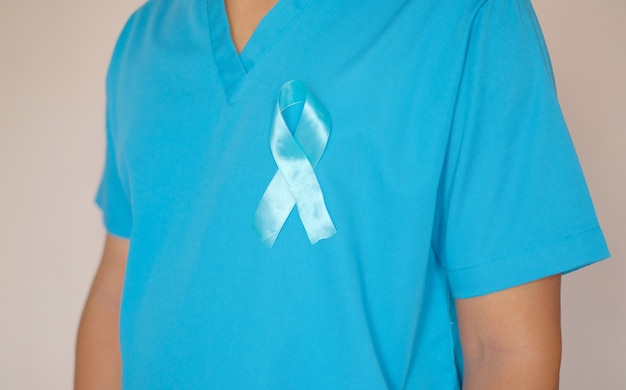 Doctor with light blue ribbon