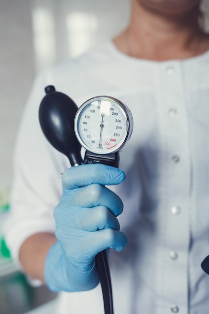 Doctor with medical blood pressure