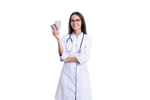 Doctor with medication pill isolated on white background doctor hold medication pill in studio