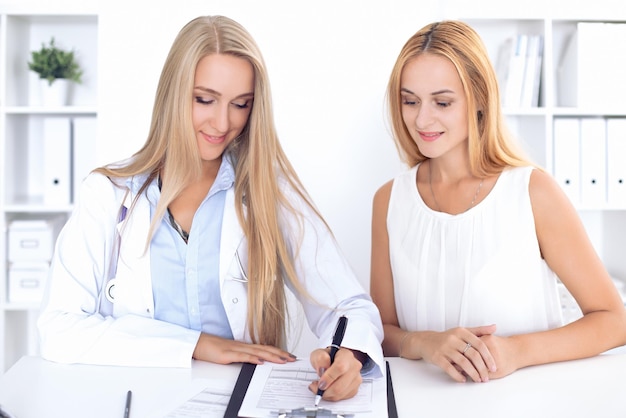 Doctor with patient in hospital