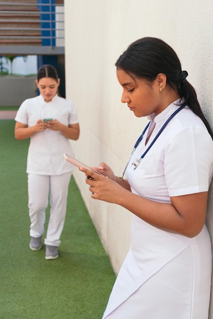 Doctor With A Phone In The Hospital