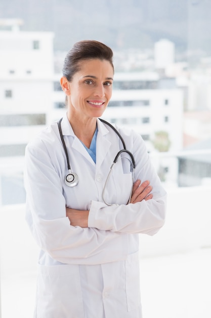 doctor with stethoscope and arms crossed