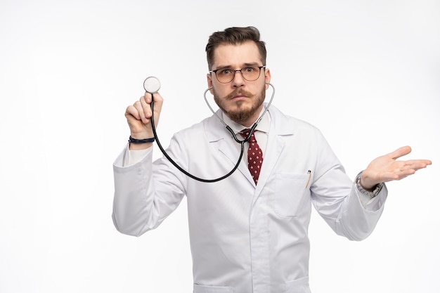 Doctor with a stethoscope in the hand, medical care concept