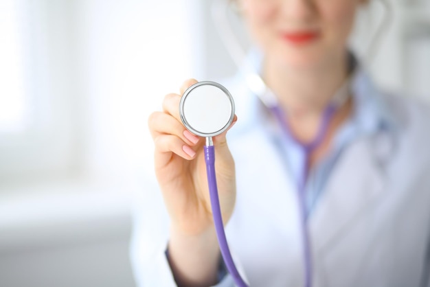 Doctor with a stethoscope in the hands