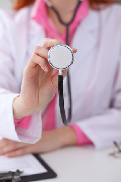 Doctor with a stethoscope in the hands