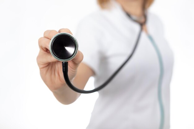 Doctor with stethoscope in her hands