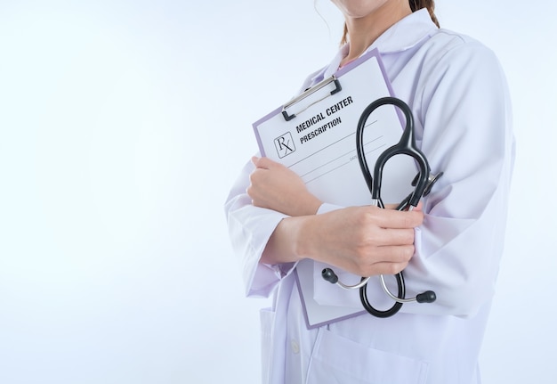 Doctor with Stethoscope working and paperwork 