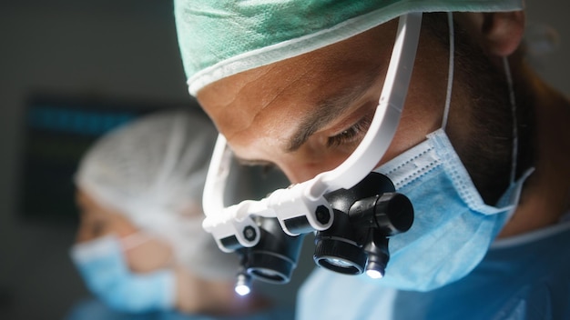 Photo doctor with surgical headlamp into operating room