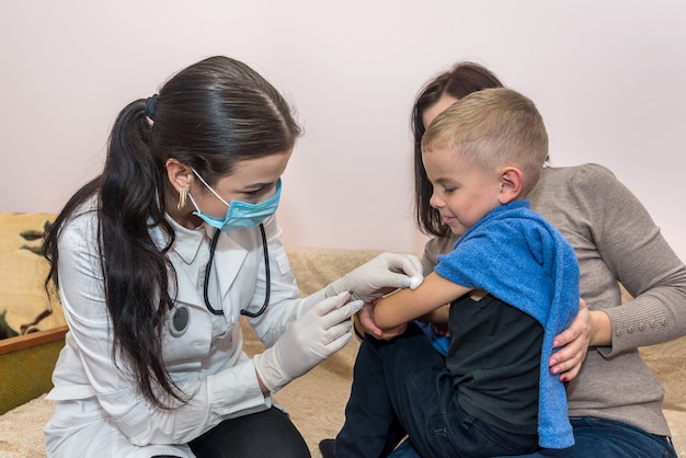 Doctor with syringe going to make injection