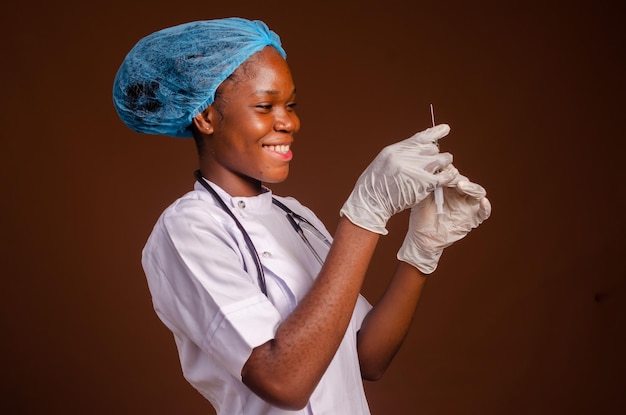 Doctor with syringe and stethoscope