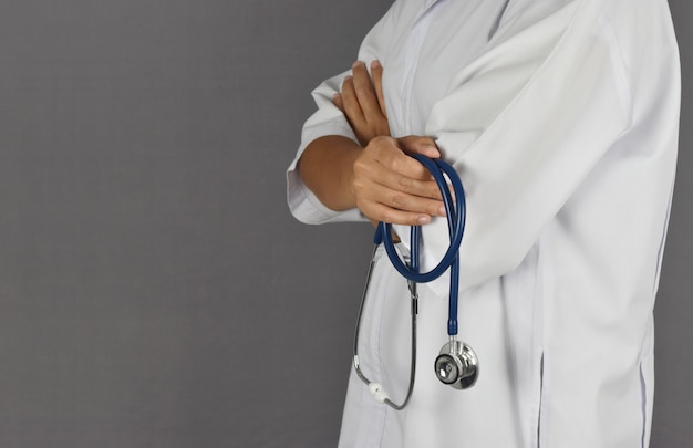 Doctor woman holding stethoscope in hands