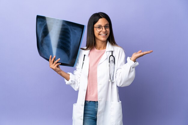 Doctor woman over isolated background