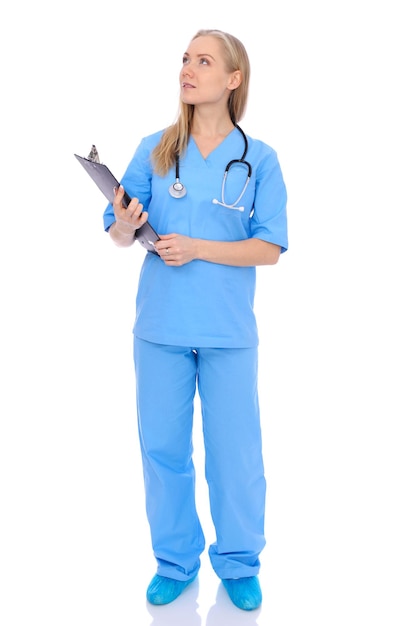 Doctor woman or nurse isolated over white background. Cheerful smiling medical staff representative. Medicine concept.