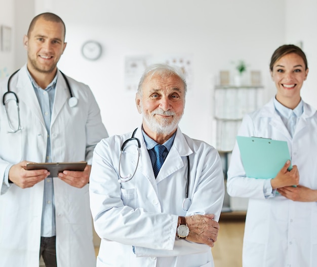 doctor woman portrait hospital team man nurse medical health medicine stethoscope professional healthcare uniform clinic teamwork group senior elderly