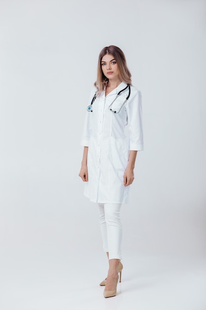 doctor woman in white coat with stethoscope