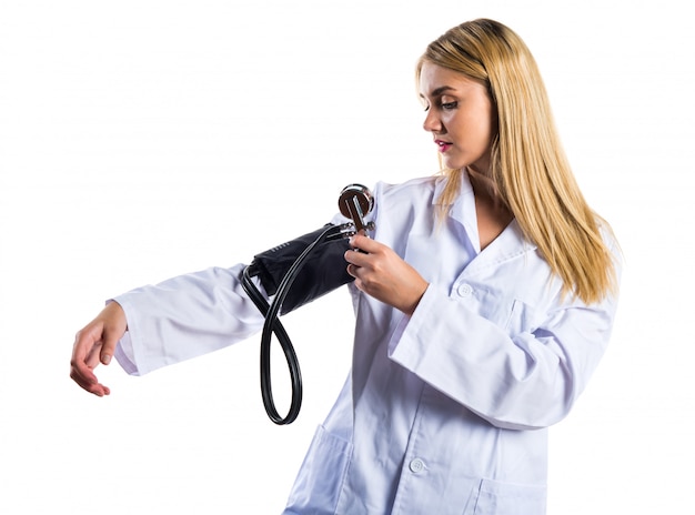 Doctor woman with blood pressure monitor