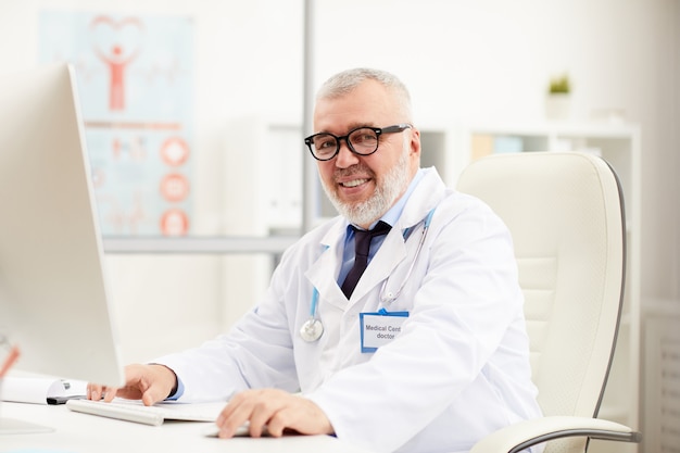 Doctor working on computer