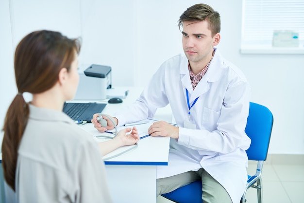 Doctor Working with Patient