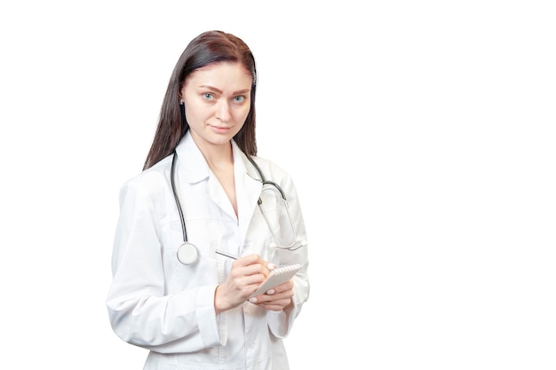 Photo doctor writes a prescription in a small notebook isolated on white background