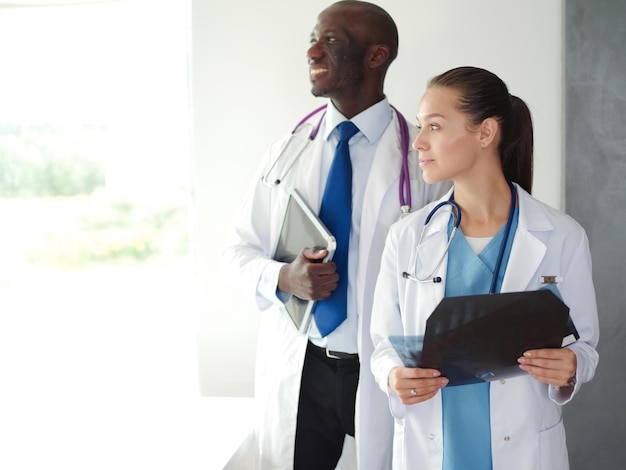 Doctors analyzing an xray in a meting Doctors