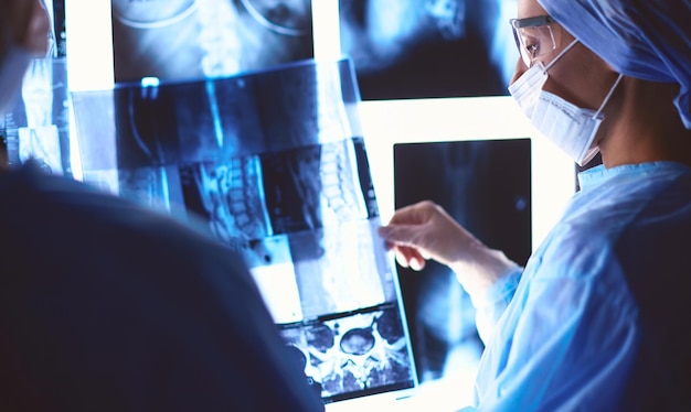 Doctors analyzing an xray in a meting