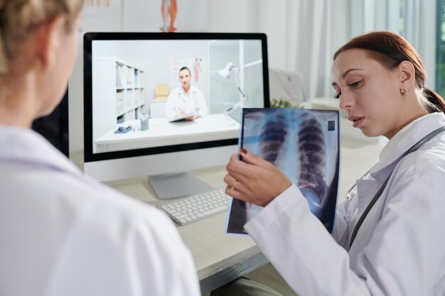 Doctors Discussing Lungs Xray