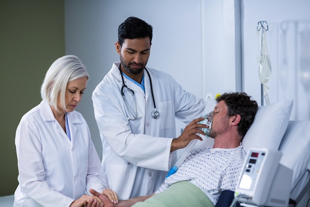 Doctors examining a patient