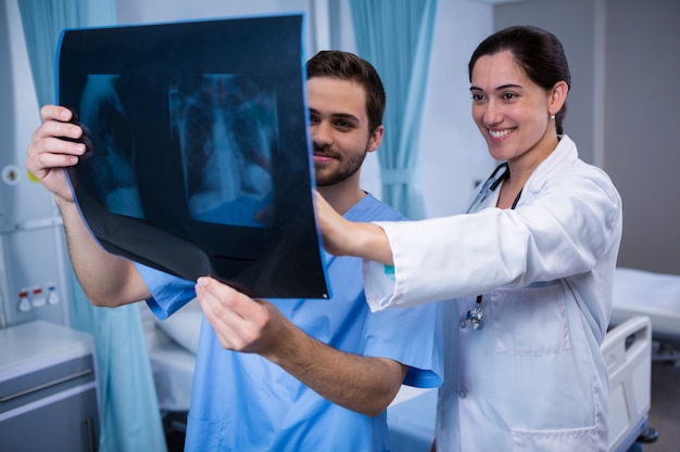 Doctors examining x-ray