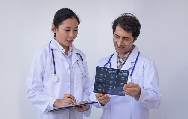 Doctors holding a clipboard with prescription