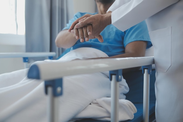 Doctors do it for the health of it Shot of a mature doctor examining his patient who is concerned about his knee