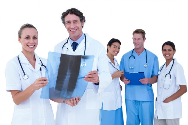 Doctors and nurse standing together