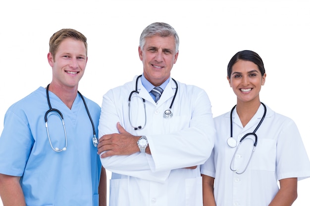 Doctors and nurse standing together