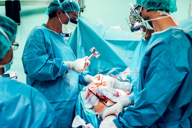 Doctors operating patient