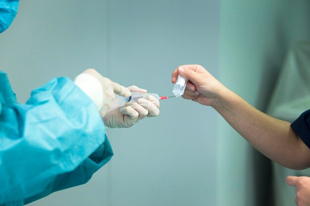 Doctors preparing injection at hospital