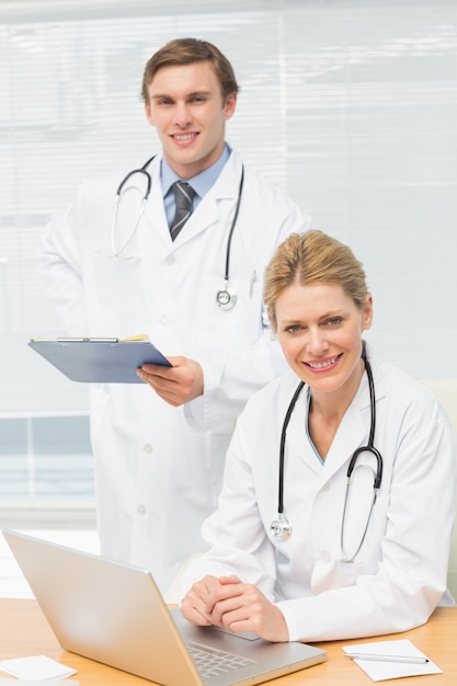 Doctors smiling at the camera together