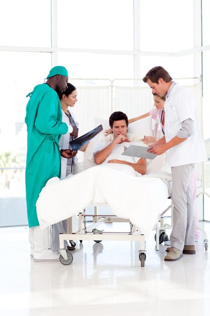 Doctors speaking to a patient