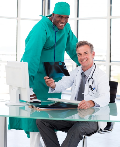 Doctors studying an X-ray